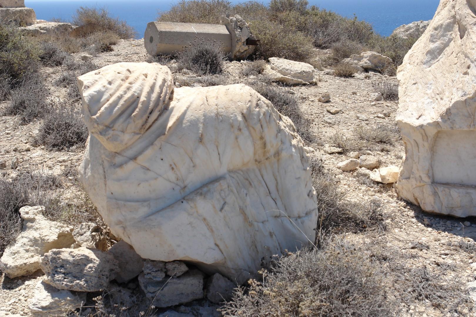 Broken parts of lighthouse statue